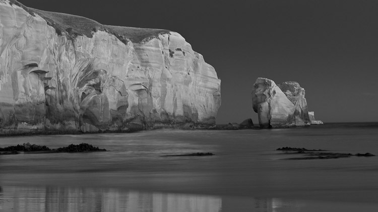 Monochrome Evening Cliffs 2, Tunnel Dunedin Beach 2009